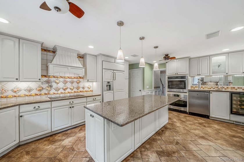 Welcome to this beautifully maintained 4-bedroom, 3-full bath - photo 8