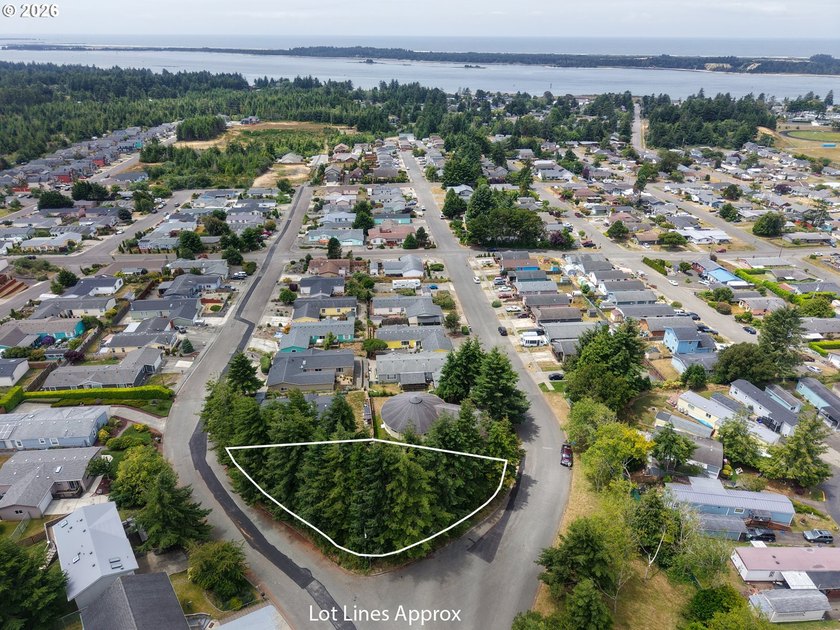 Ocean and bay view lot with utilities already in place! This - photo 20