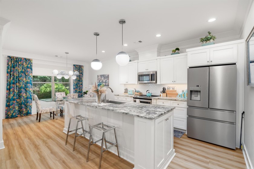 Welcome to this beautifully crafted Renaissance-built home in - photo 6