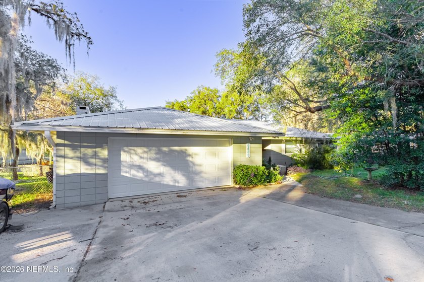 Wake up to peaceful lake views in this beautifully updated - photo 4
