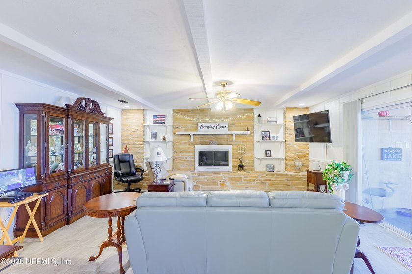 Wake up to peaceful lake views in this beautifully updated - photo 8