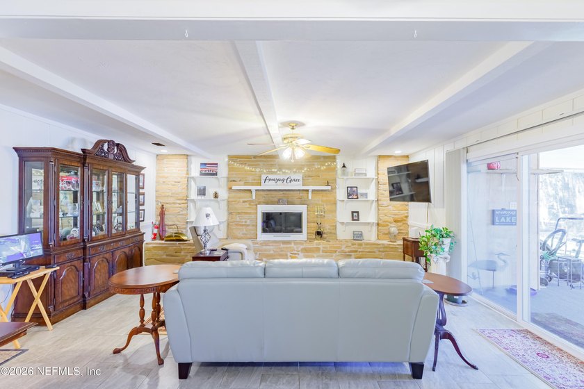Wake up to peaceful lake views in this beautifully updated - photo 9