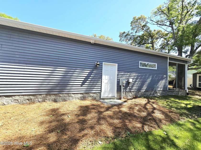 This charming custom built ranch has two screened porches - photo 22