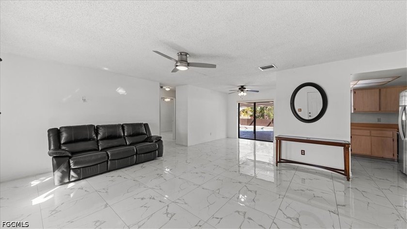 Welcome home to this charming pool home perfectly situated on a - photo 4