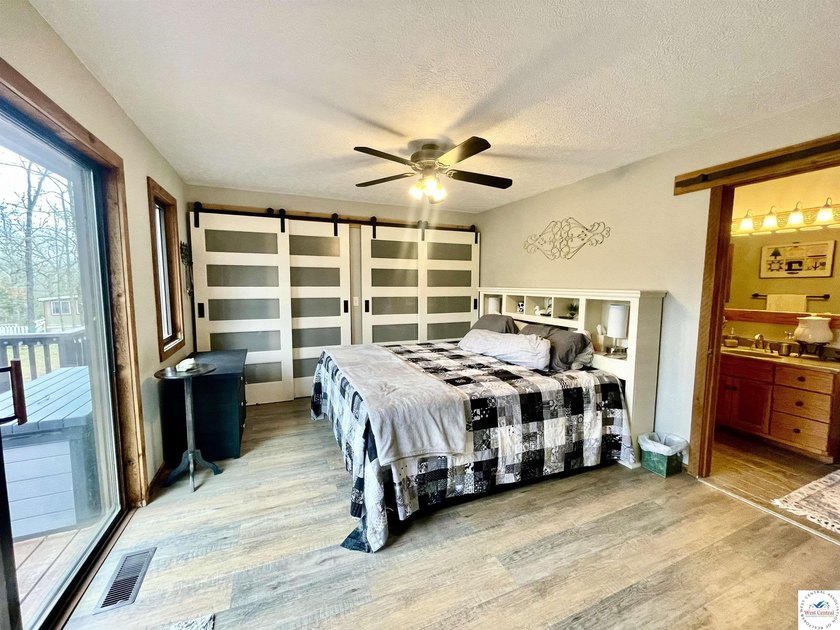 Enjoy peaceful lake living in this bright and beautiful home - photo 32