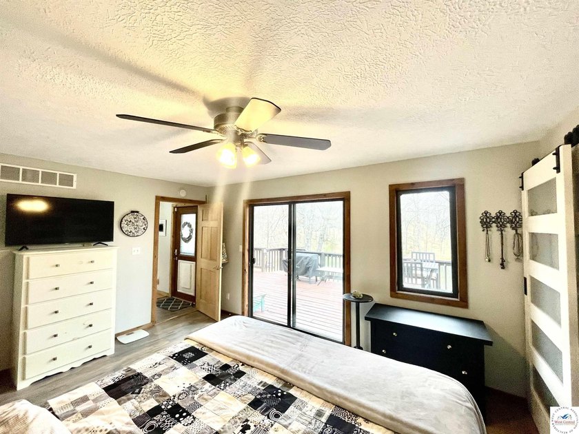 Enjoy peaceful lake living in this bright and beautiful home - photo 33