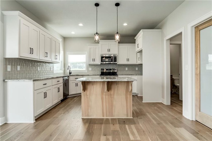 Camden Model Now Available with ADDED Main floor hardwoods! - photo 5