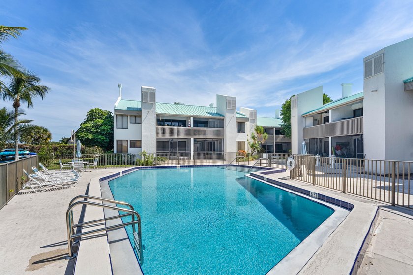Newly remodeled 2/2 waterfront North Palm condo available on the - photo 5