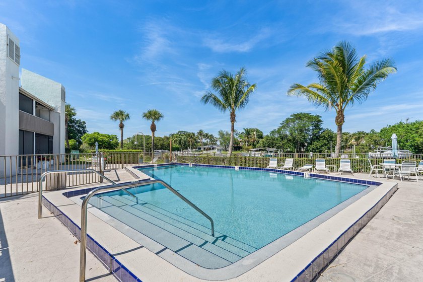 Newly remodeled 2/2 waterfront North Palm condo available on the - photo 6