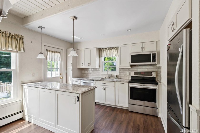 Welcome to this charming 3 bedroom,1.5 bath colonial featuring - photo 9