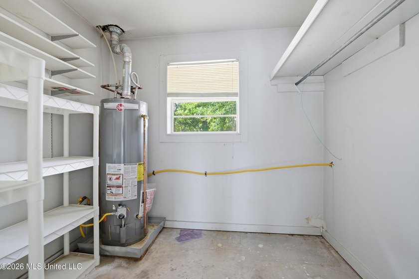 This cozy 3-bedroom, 2-bath home is full of potential! Being - photo 18