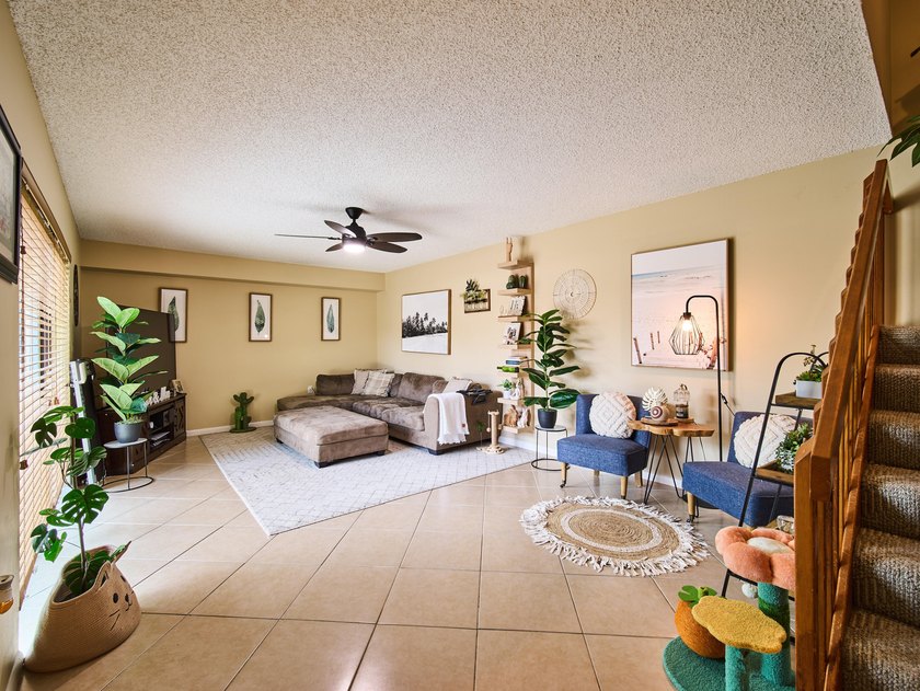 Complete impact sliders and brand-new A/C! This cozy townhome - photo 2