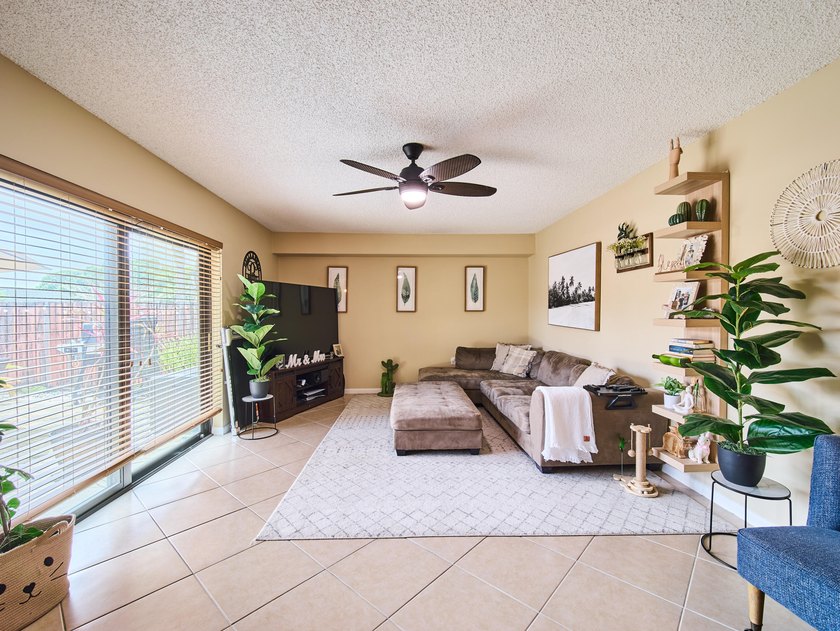 Complete impact sliders and brand-new A/C! This cozy townhome - photo 3