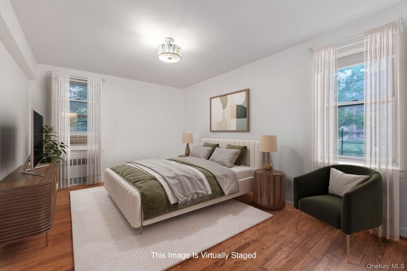 Welcome to this bright and spacious corner one bedroom apartment - photo 4