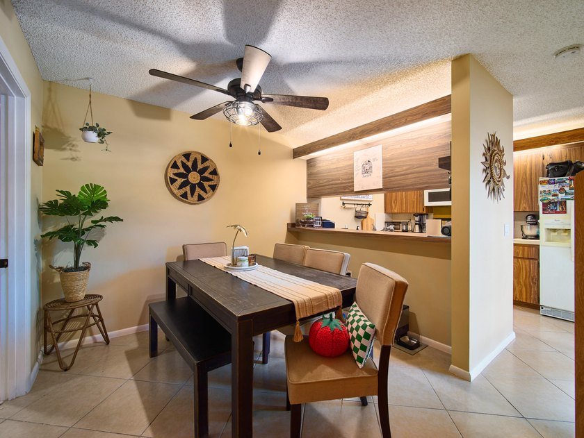 Complete impact sliders and brand-new A/C! This cozy townhome - photo 4