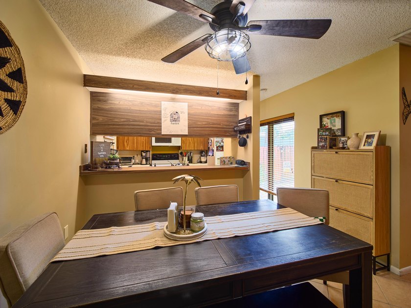 Complete impact sliders and brand-new A/C! This cozy townhome - photo 5