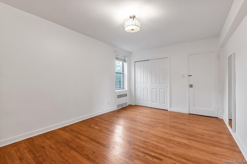 Welcome to this bright and spacious corner one bedroom apartment - photo 6