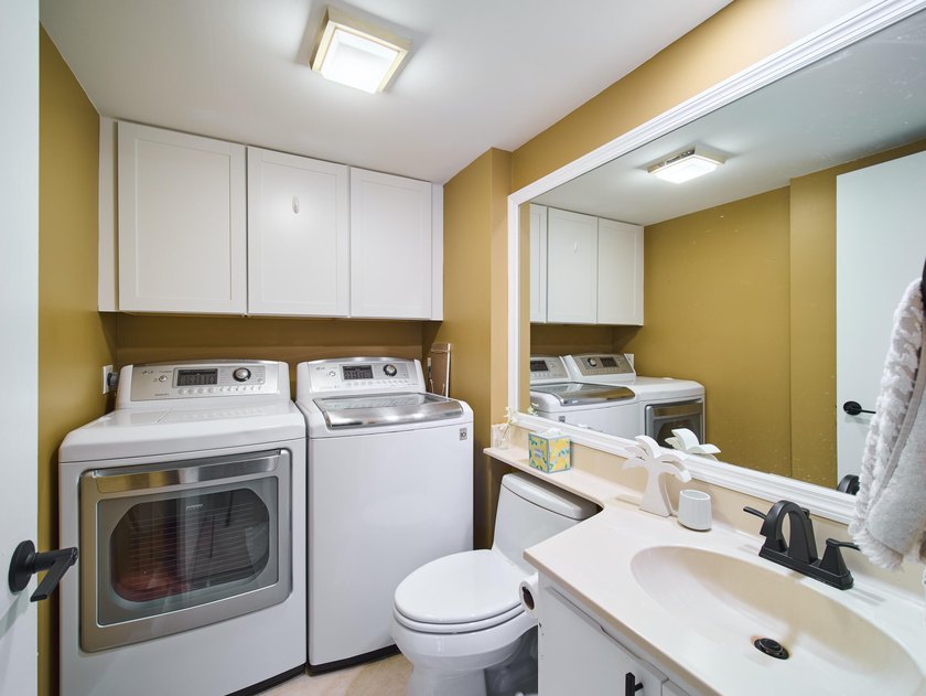 Complete impact sliders and brand-new A/C! This cozy townhome - photo 8
