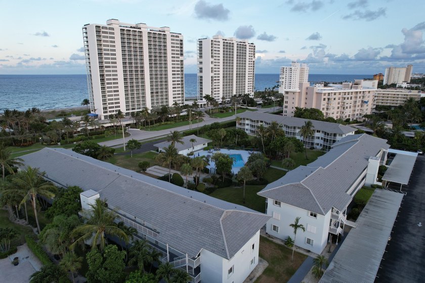 Welcome to this charming two-bedroom, two-bathroom condominium - photo 3