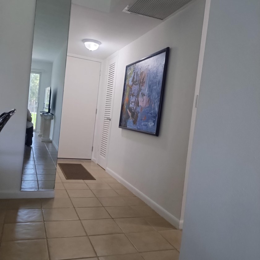 Welcome to this charming two-bedroom, two-bathroom condominium - photo 4