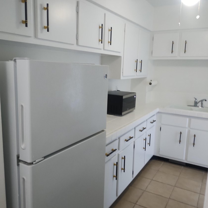 Welcome to this charming two-bedroom, two-bathroom condominium - photo 5