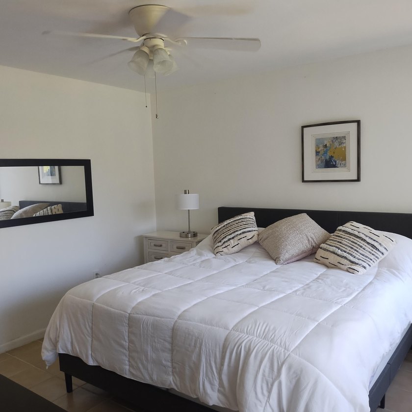 Welcome to this charming two-bedroom, two-bathroom condominium - photo 8