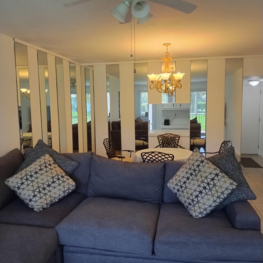 Welcome to this charming two-bedroom, two-bathroom condominium - photo 9