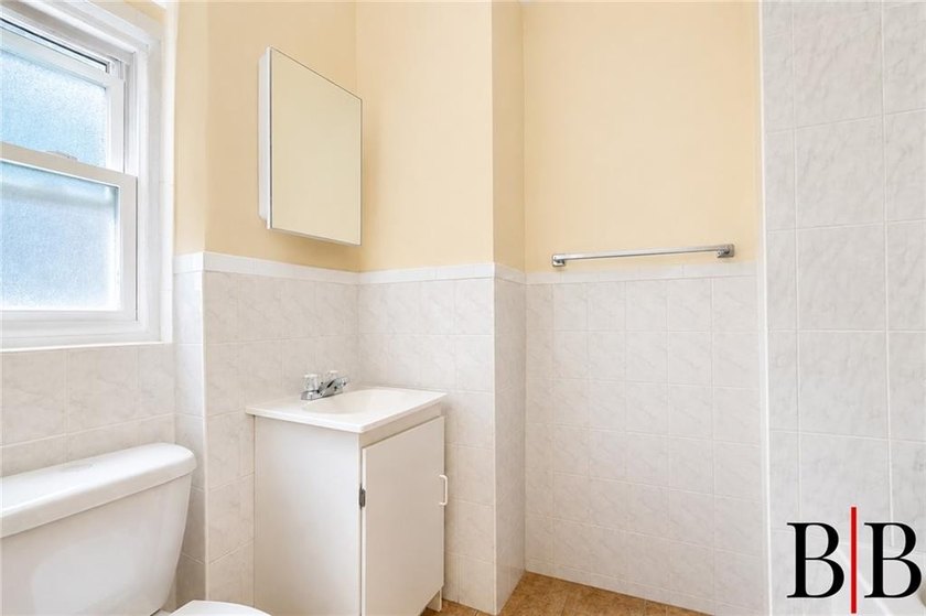 Amazing opportunity to present this two family property in the - photo 22