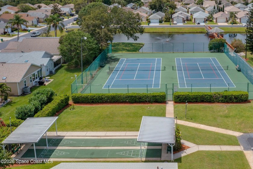 Located in the highly desirable gated community of South Oaks - photo 34