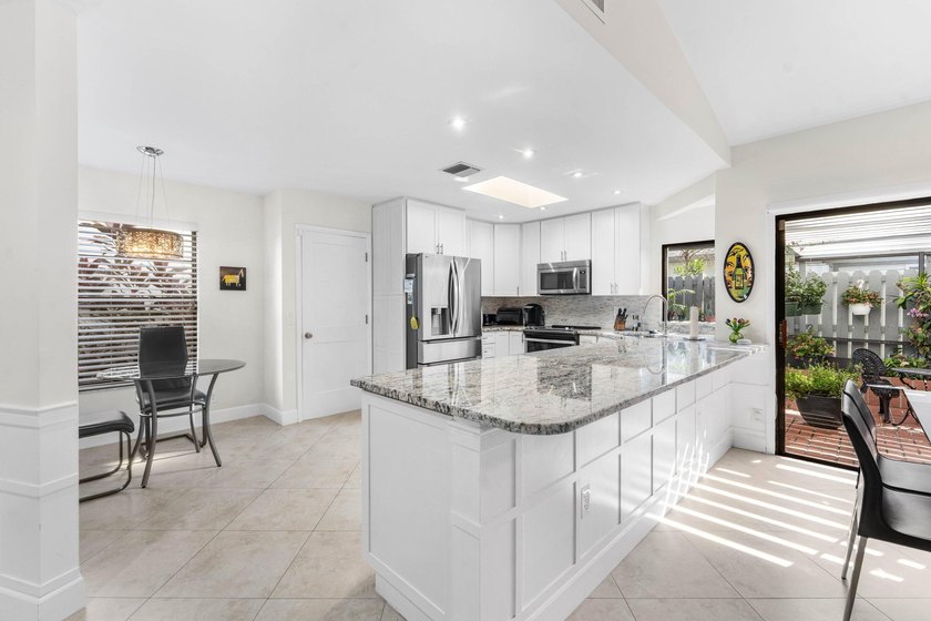 Experience the very best of waterfront living in this - photo 12