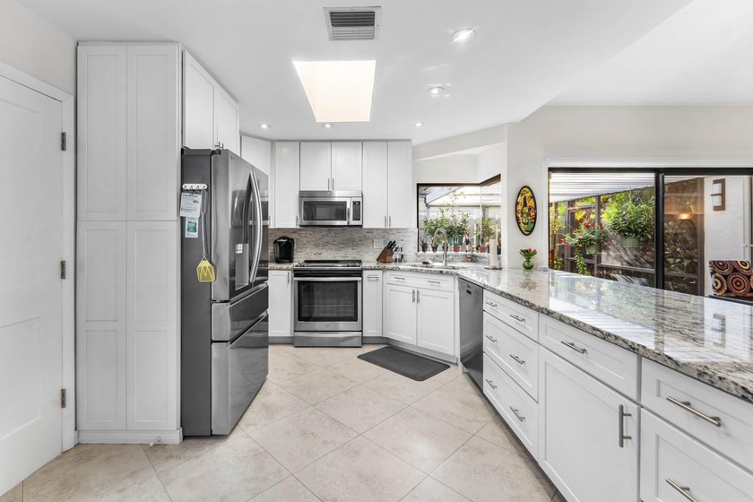 Experience the very best of waterfront living in this - photo 13
