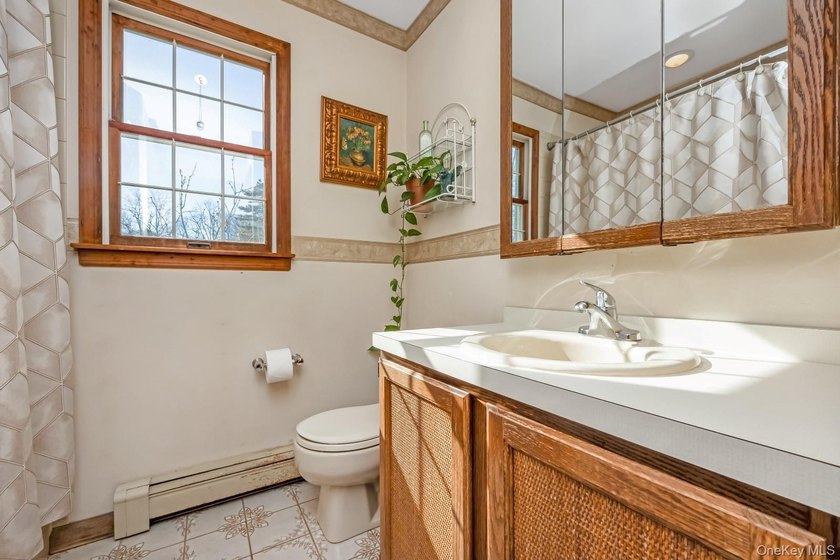 Welcome home to this inviting Colonial-style 4-bedroom oasis in - photo 17