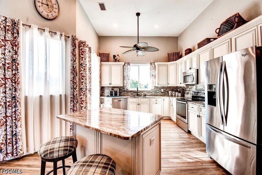 Welcome to this beautifully maintained 3-bedroom, 2-bath home - photo 3