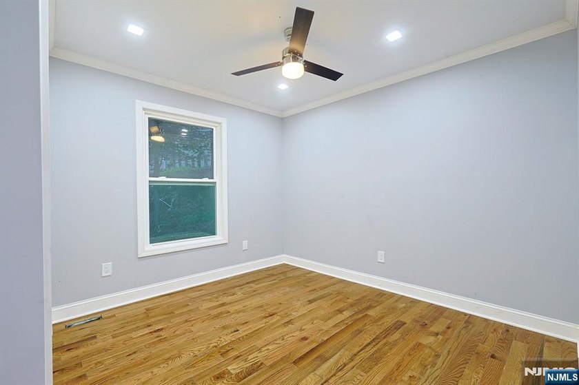 Welcome to this beautifully renovated ranch, nestled in a - photo 7