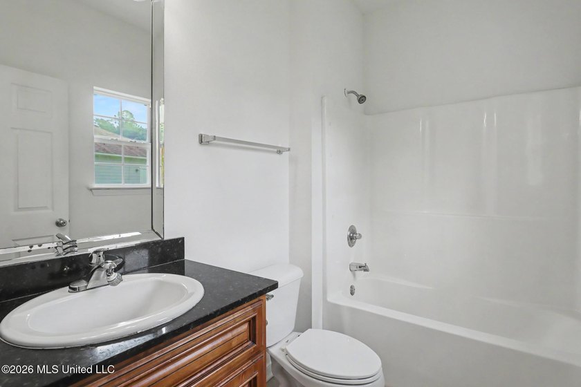 Welcome home to 11609 Oaklane Drive in north Gulfport! This - photo 12