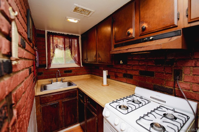Legal two-family Colonial tucked away on large cul-de-sac - photo 9