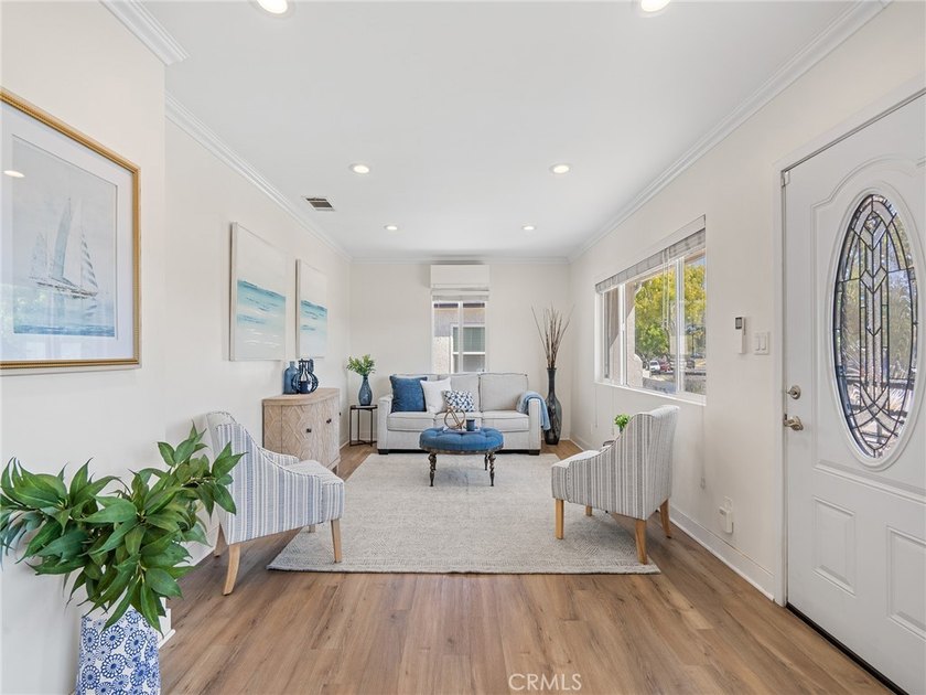 Welcome to a home where timeless charm meets breathtaking harbor - photo 4