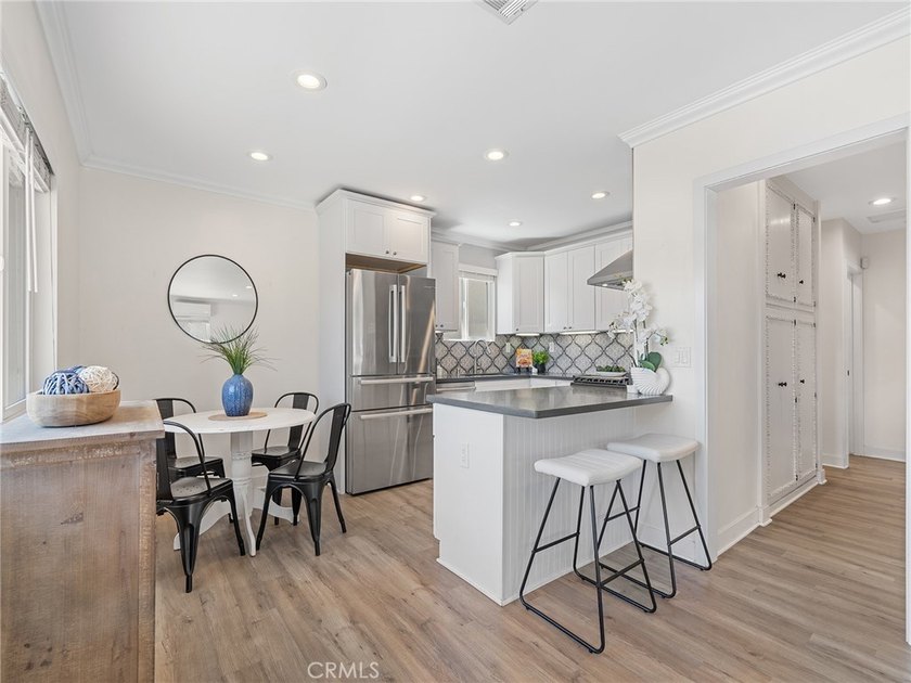 Welcome to a home where timeless charm meets breathtaking harbor - photo 8