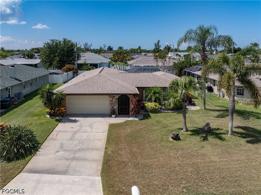 Looking for a home with TWO Primary Suites? Welcome to your new - photo 3