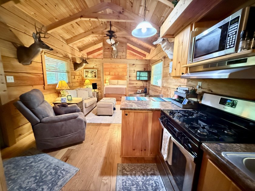 Set on 32.69 scenic acres, this charming log home offers a - photo 13
