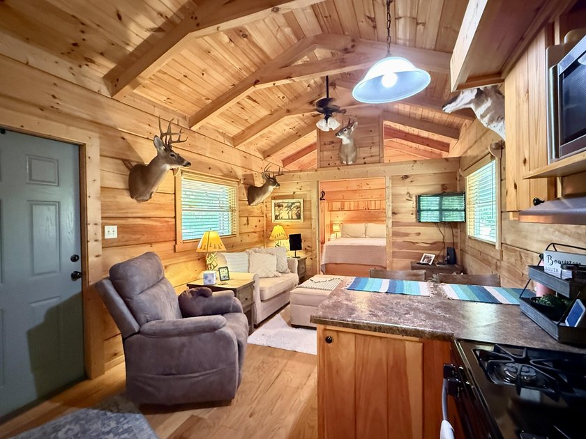 Set on 32.69 scenic acres, this charming log home offers a - photo 14