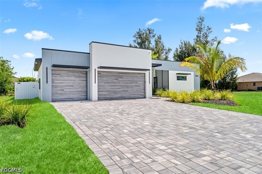 Experience modern luxury waterfront living in this stunning - photo 4