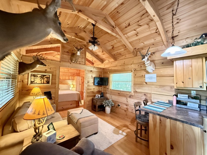 Set on 32.69 scenic acres, this charming log home offers a - photo 15