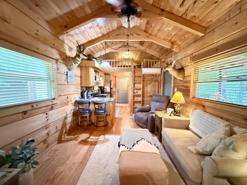 Set on 32.69 scenic acres, this charming log home offers a - photo 19