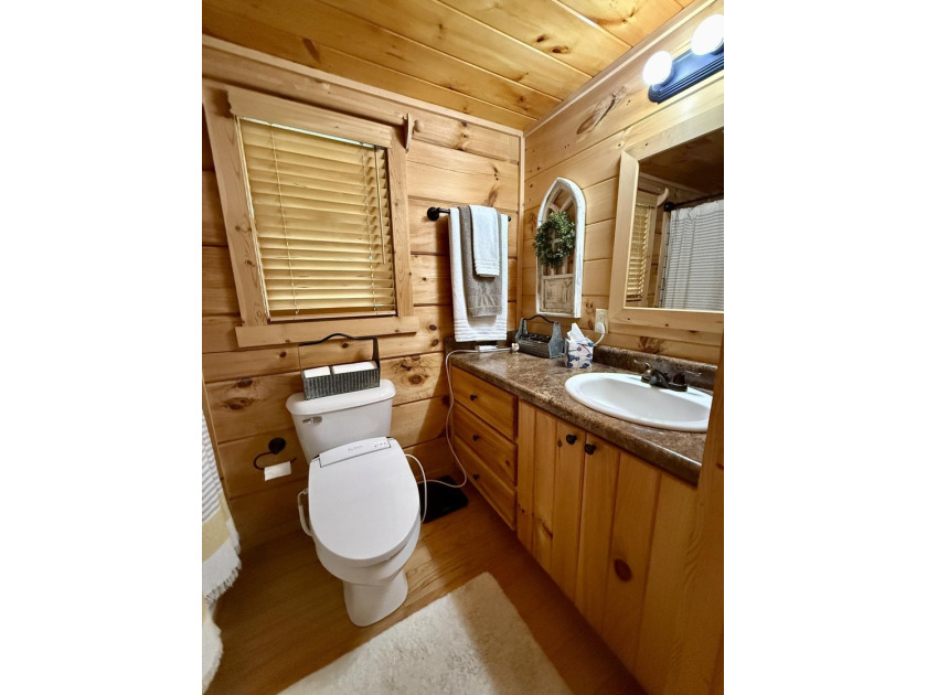 Set on 32.69 scenic acres, this charming log home offers a - photo 22