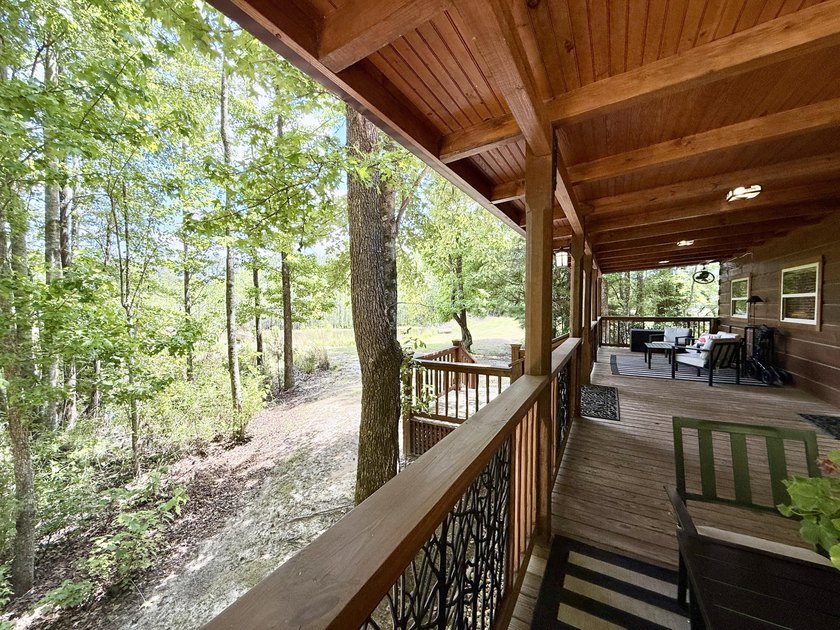 Set on 32.69 scenic acres, this charming log home offers a - photo 25