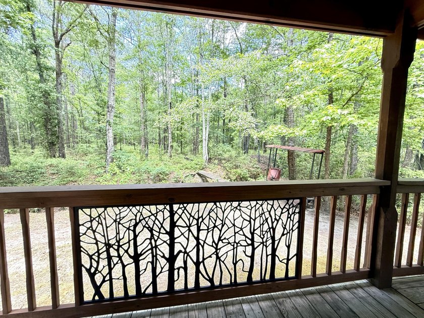 Set on 32.69 scenic acres, this charming log home offers a - photo 26