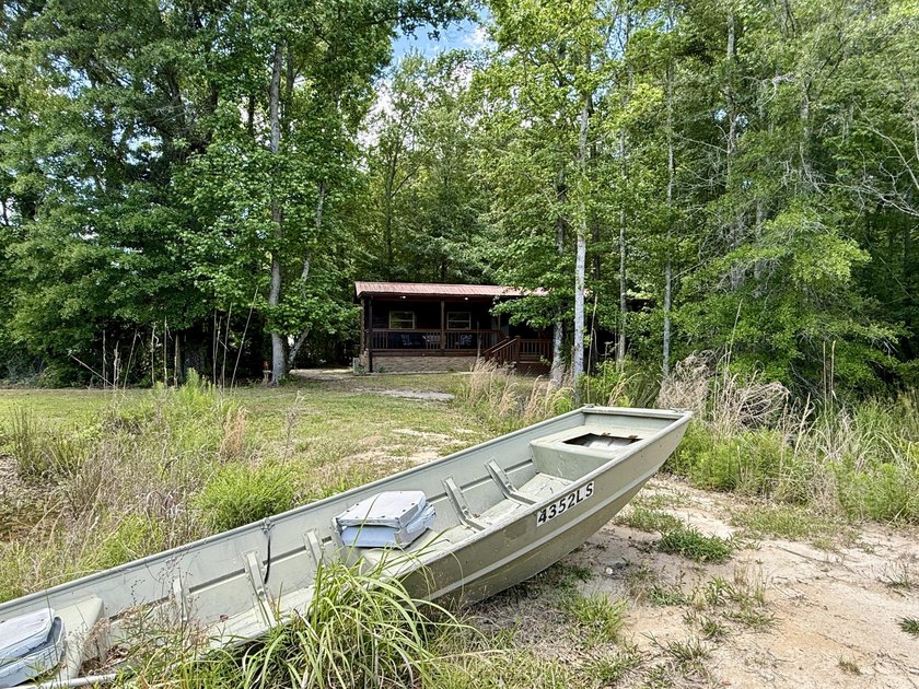 Set on 32.69 scenic acres, this charming log home offers a - photo 40