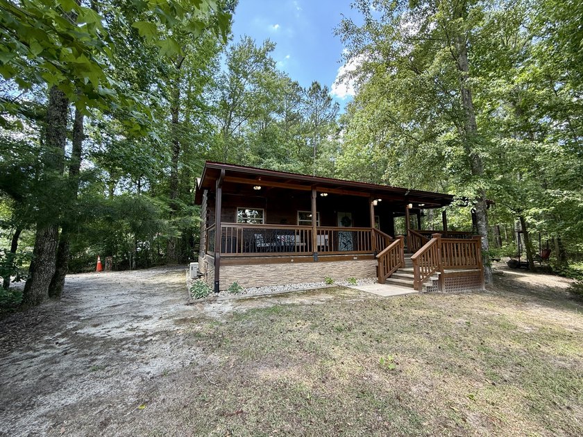 Set on 32.69 scenic acres, this charming log home offers a - photo 42