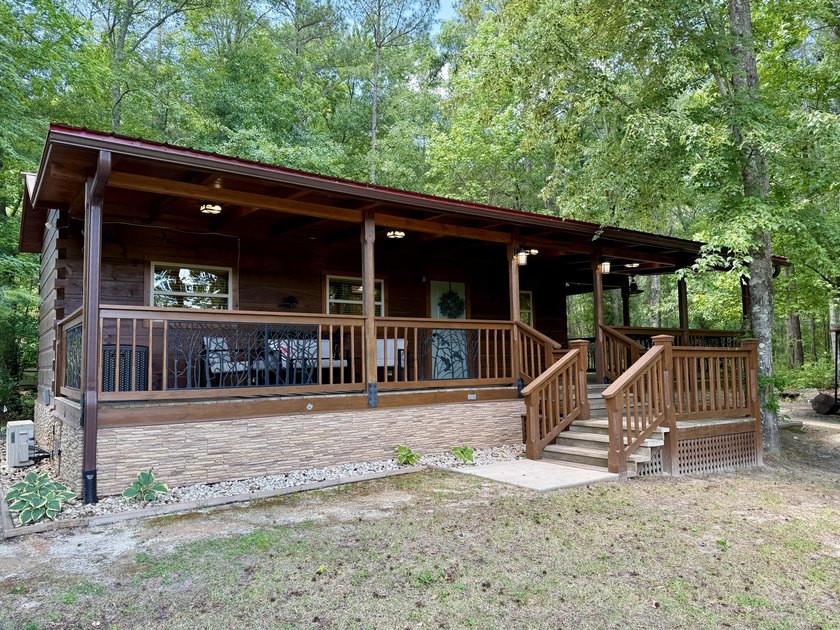 Set on 32.69 scenic acres, this charming log home offers a - photo 43